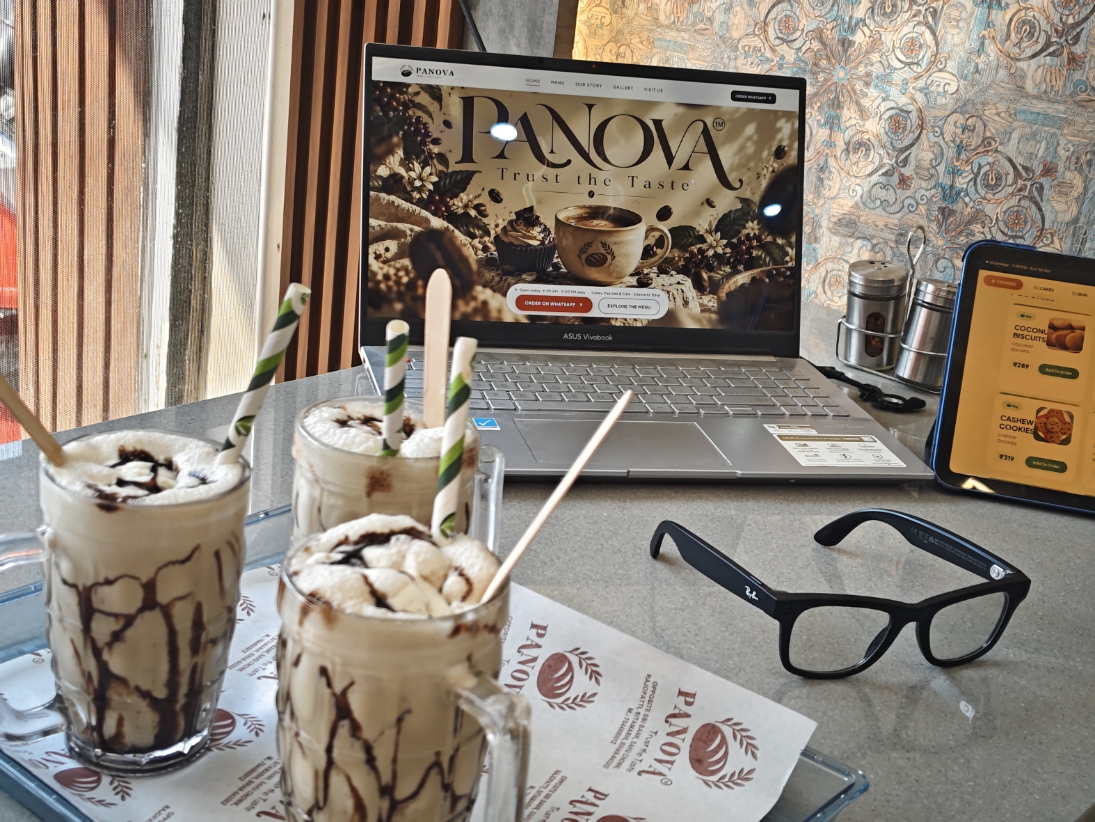 Panova signature iced cold coffee on café table with Panova liner